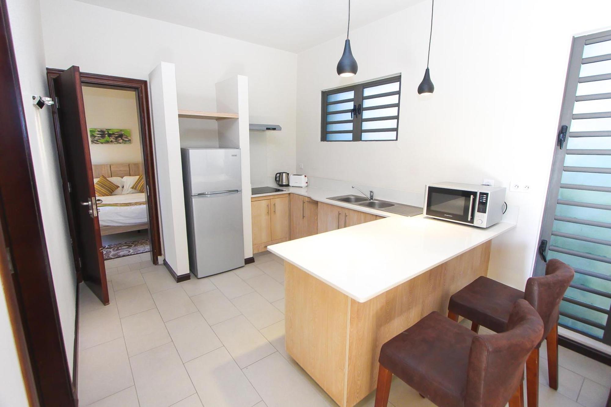 Nitzana Residences & Restaurant Pereybere Beach Bilik gambar